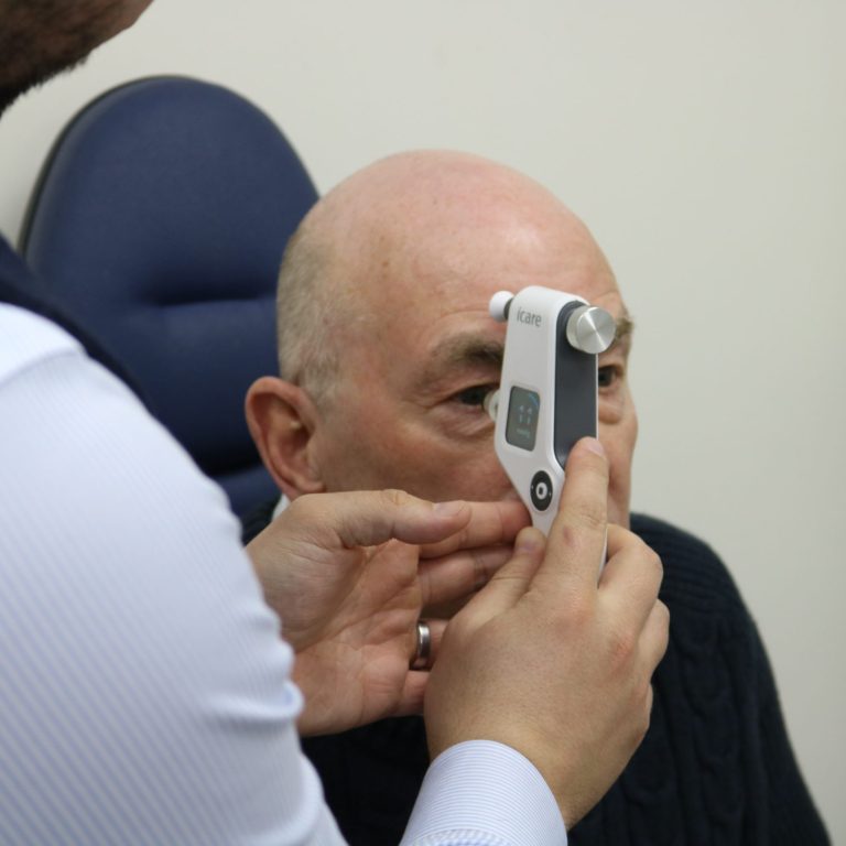 person having eye exam - how often for eye tests